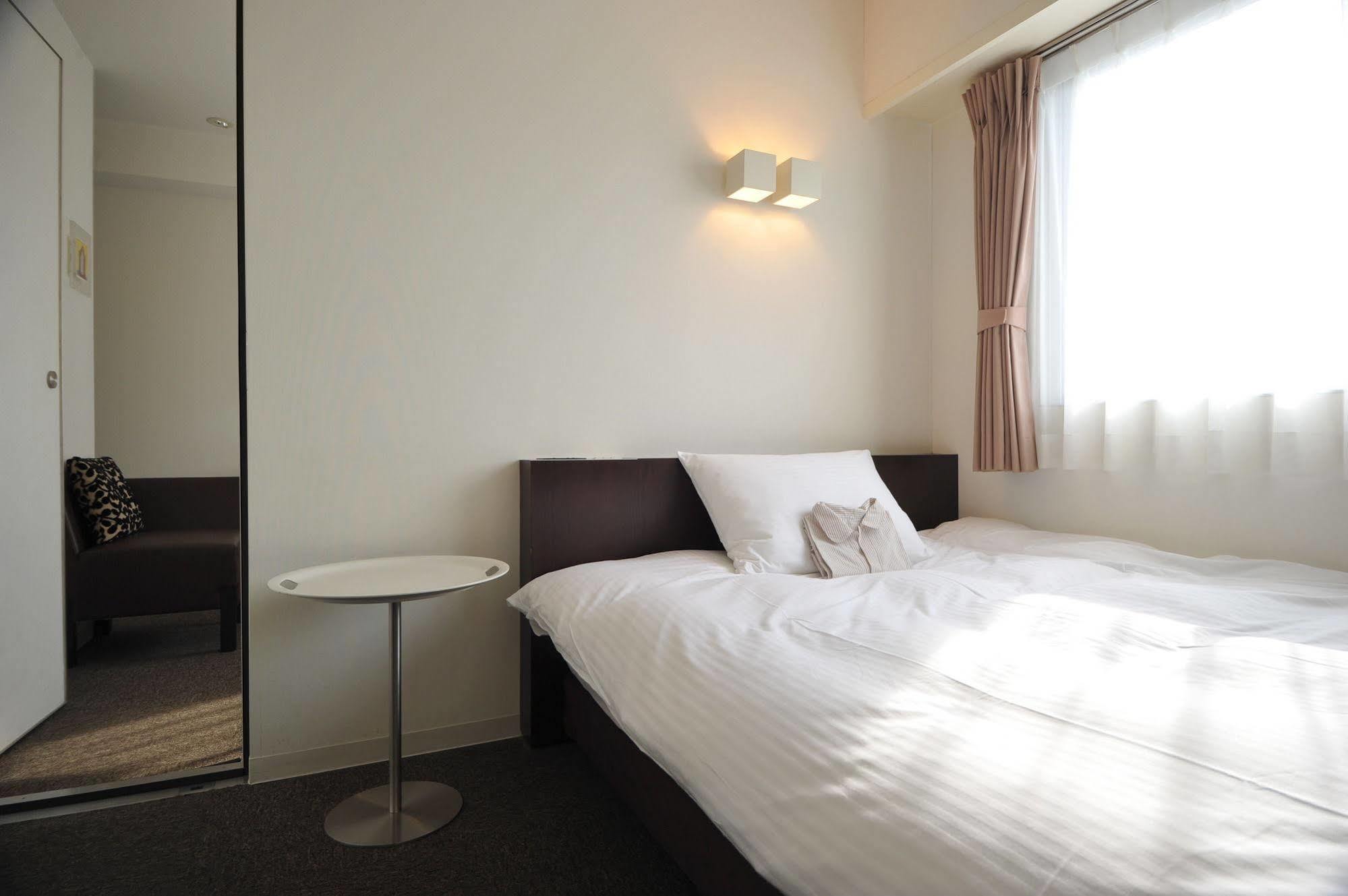 7 Days Hotel Plus Kōchi Buitenkant foto